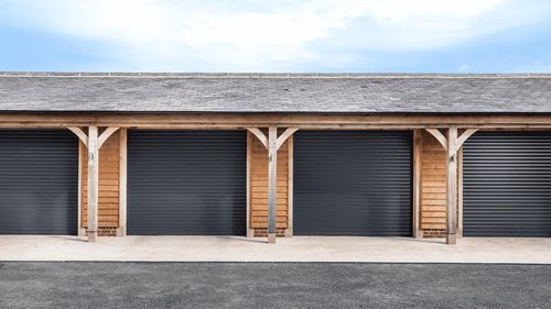 4 Garolla electric garage doors in wooden garage